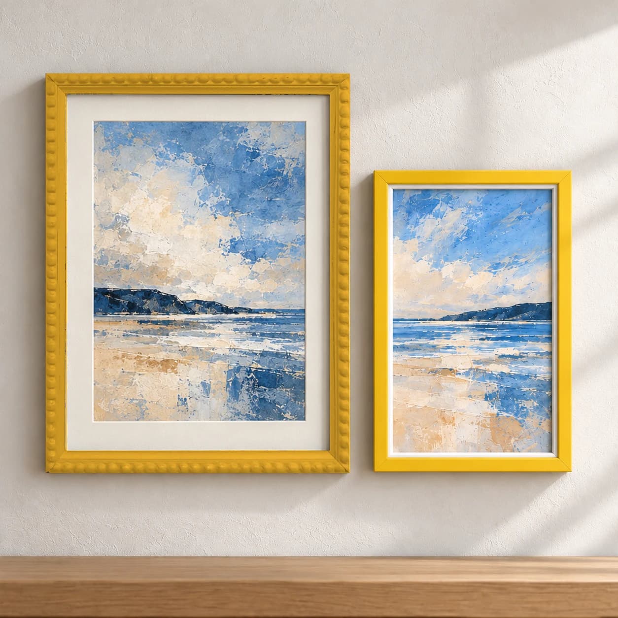 Group of yellow picture frames with sample artwork